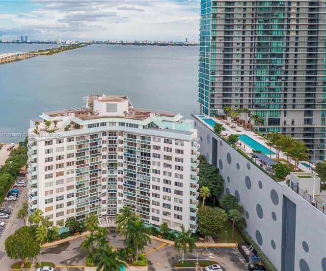 3301 NE 5th Ave Unit 110, Miami, FL 33137 - drone / aerial view of a nearby body of water and a pool area