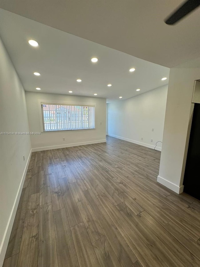 empty room featuring hardwood / wood-style flooring