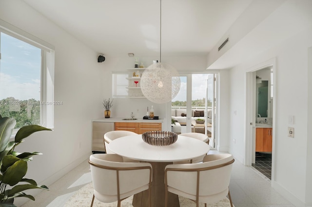 dining area featuring plenty of natural light