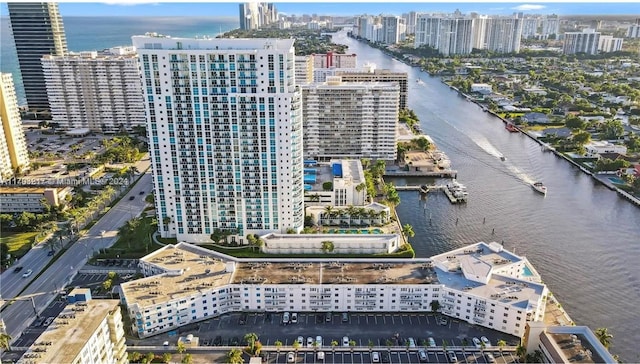 birds eye view of property featuring a water view