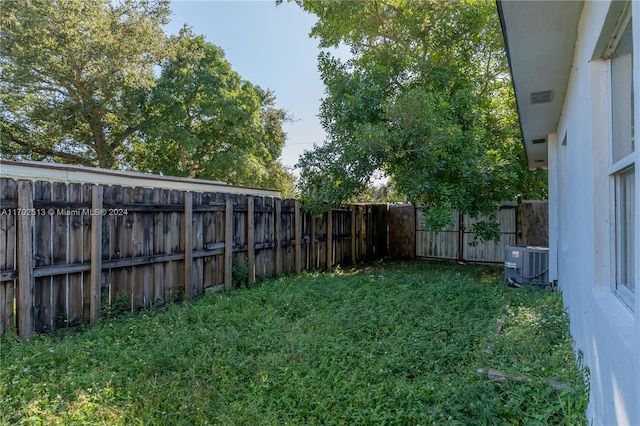 view of yard featuring cooling unit