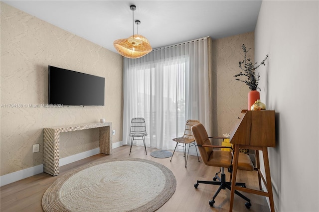 living area with wood-type flooring