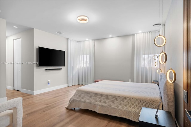 bedroom featuring light hardwood / wood-style floors