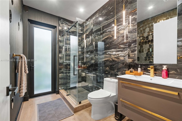 bathroom featuring decorative backsplash, toilet, wood-type flooring, and tile walls