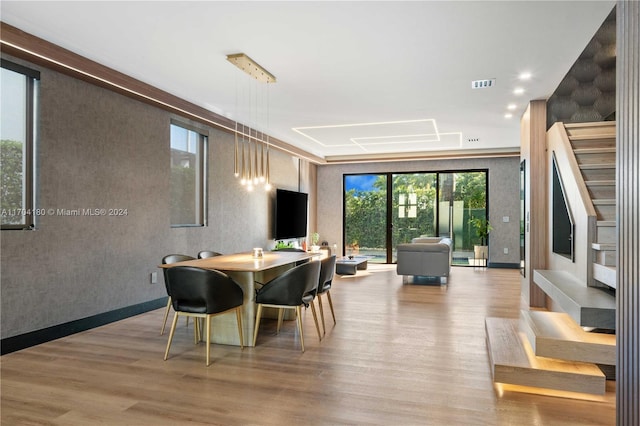 dining room with light wood-type flooring