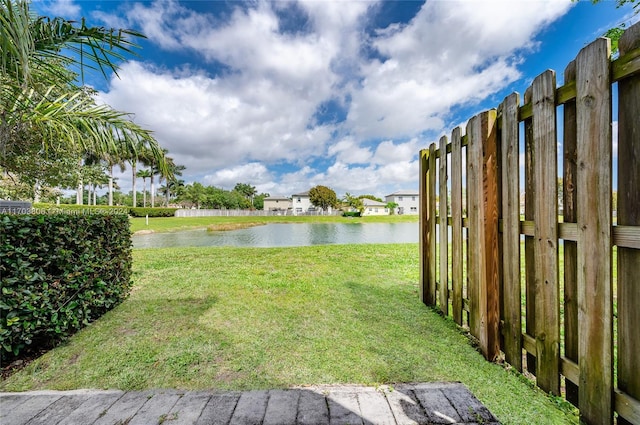 view of yard with a water view