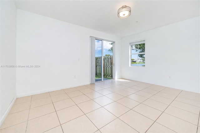 view of tiled spare room