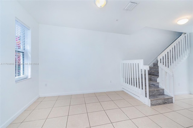 interior space featuring tile patterned flooring