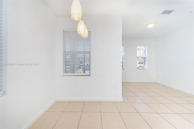 view of tiled spare room