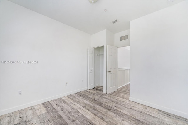 unfurnished bedroom featuring light hardwood / wood-style floors