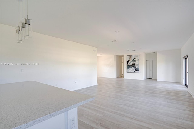 living room with light hardwood / wood-style floors