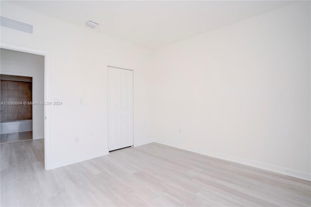 empty room featuring light hardwood / wood-style floors