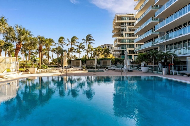 community pool with a patio area