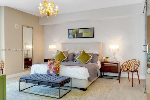 bedroom featuring a chandelier, light colored carpet, and baseboards