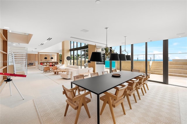 dining space with a water view