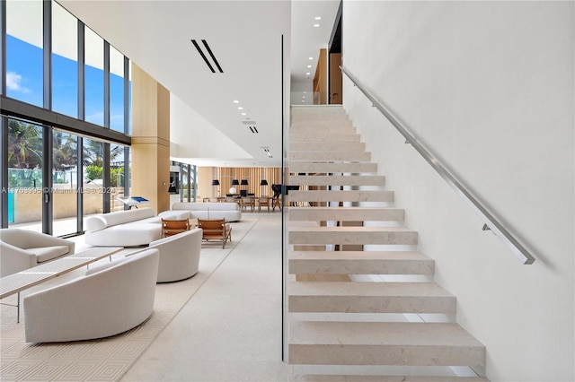 stairs with a towering ceiling