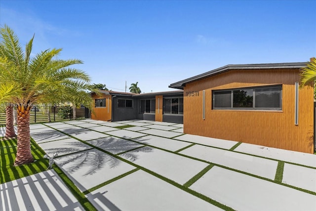 back of house featuring a patio area