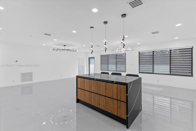 kitchen featuring pendant lighting and a center island