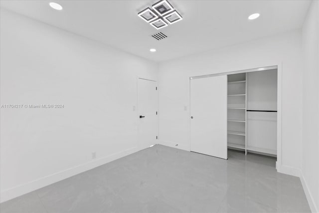 unfurnished bedroom with a closet