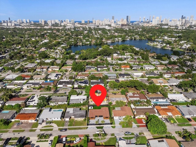 birds eye view of property featuring a water view