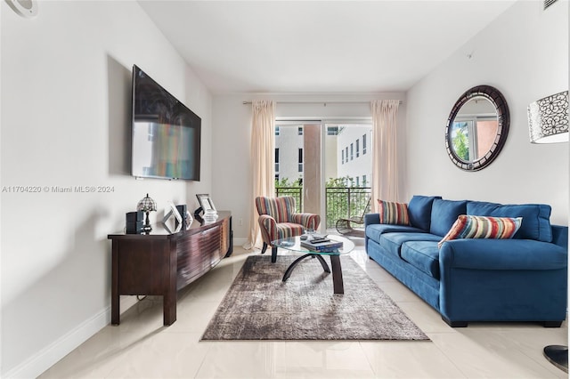 living room with light tile patterned floors