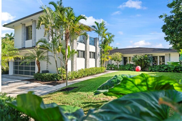 9301 N Bayshore Dr, Miami Shores, FL 33138 - surrounding community with a lawn