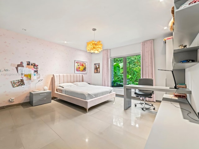 9301 N Bayshore Dr, Miami Shores, FL 33138 - bedroom with wallpapered walls, an office area, and tile patterned flooring