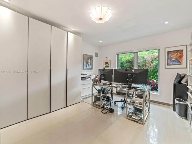 9301 N Bayshore Dr, Miami Shores, FL 33138 - office featuring tile patterned floors and baseboards