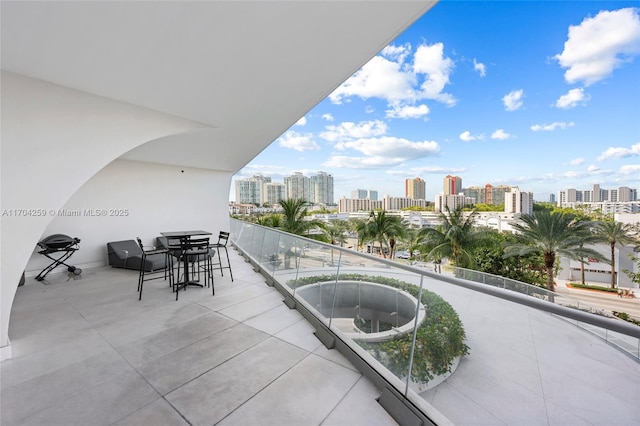balcony featuring a city view