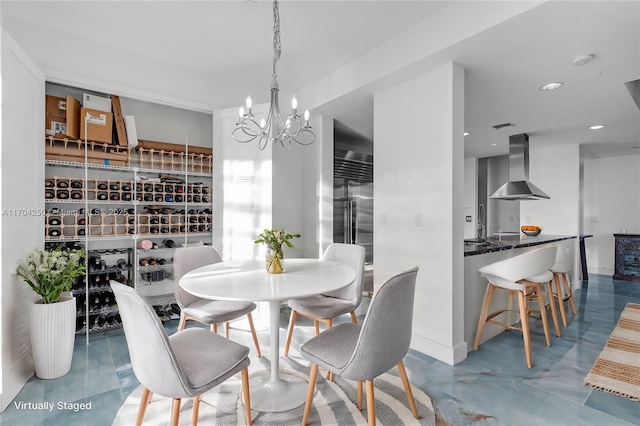 dining room featuring a notable chandelier