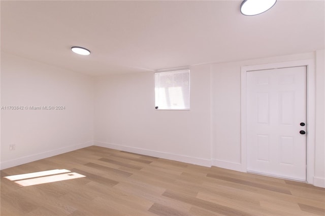 spare room featuring light wood-type flooring