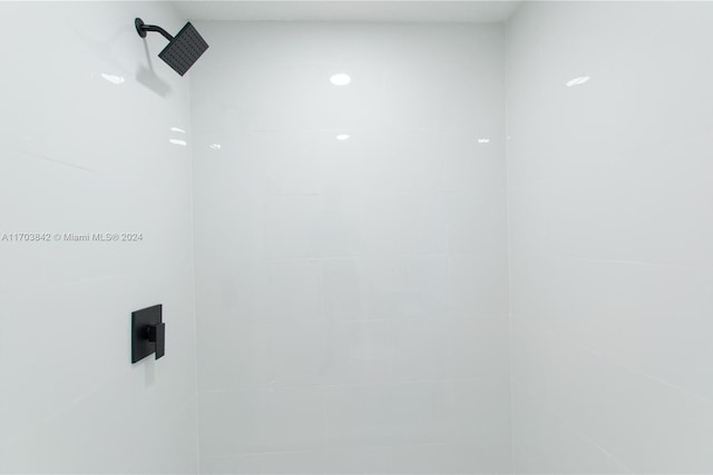 room details with a tile shower