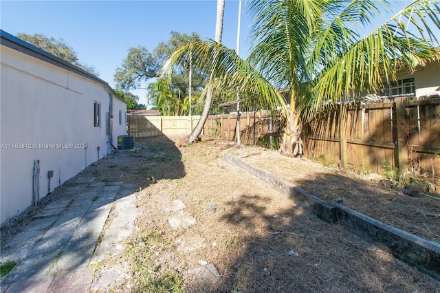 view of yard featuring central AC unit