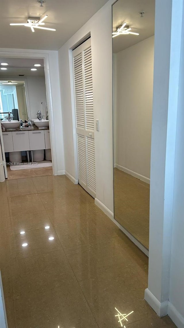 41 SE 5th St Unit 2011, Miami, FL 33131 - corridor with baseboards, an office area, and tile patterned floors