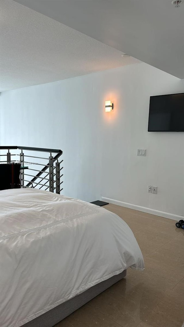 41 SE 5th St Unit 2011, Miami, FL 33131 - bedroom featuring baseboards