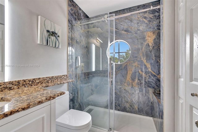 bathroom featuring walk in shower, vanity, and toilet