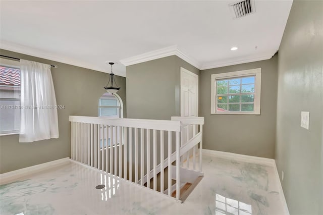 hallway with crown molding