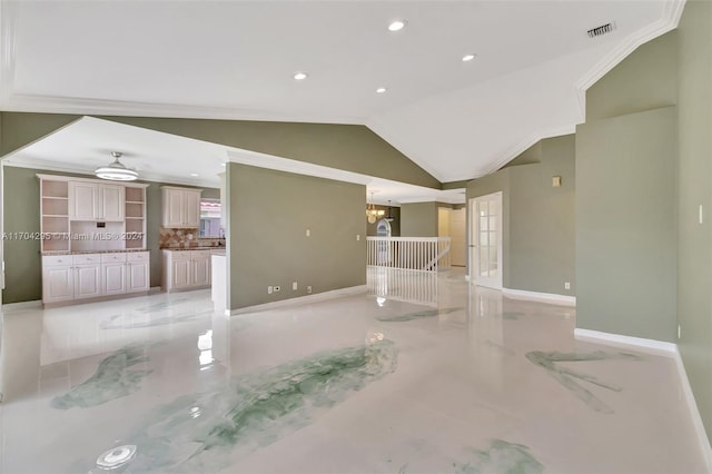 unfurnished living room featuring an inviting chandelier, crown molding, and vaulted ceiling