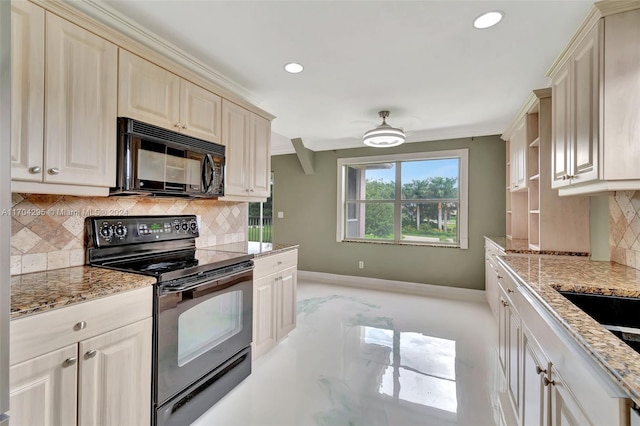 kitchen featuring decorative backsplash, black appliances, light stone counters, and cream cabinetry