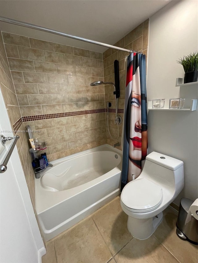 bathroom featuring tile patterned floors, shower / tub combo with curtain, and toilet