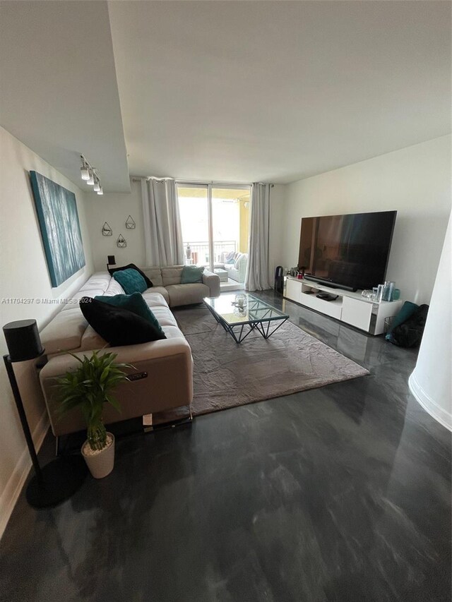 7350 SW 89th St Unit 817S, Miami, FL 33156 - living room with baseboards