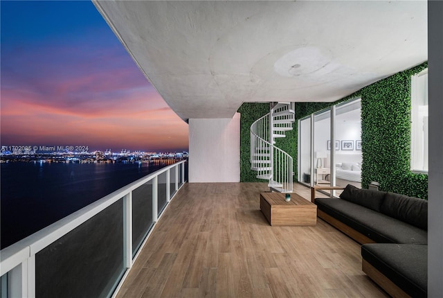 balcony at dusk with outdoor lounge area