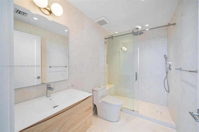 bathroom featuring vanity, toilet, and an enclosed shower