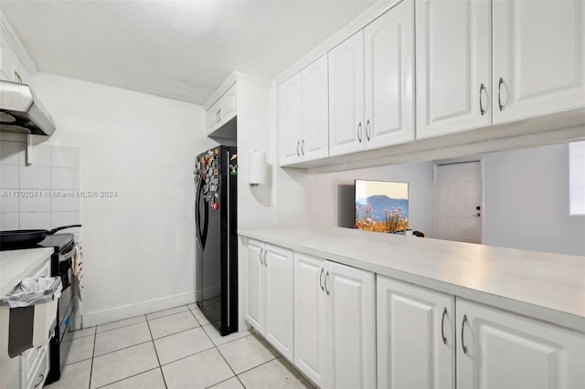 kitchen featuring backsplash, white cabinets, black appliances, light tile patterned flooring, and kitchen peninsula