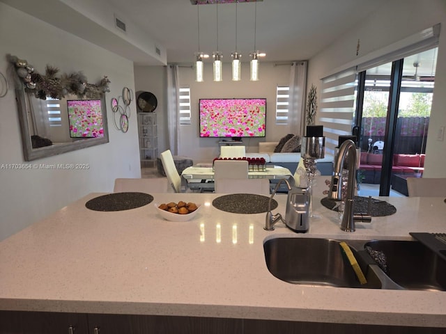 kitchen with sink and decorative light fixtures