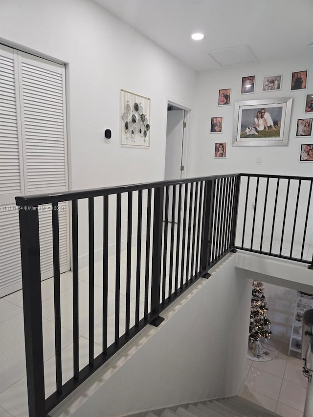 hallway with light tile patterned floors