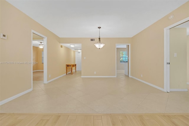 view of tiled spare room