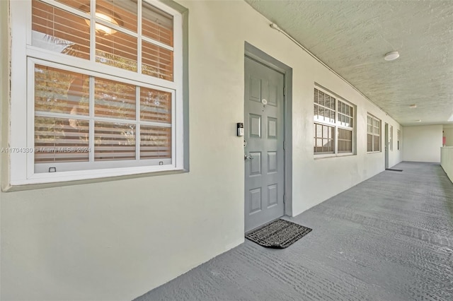 doorway to property with covered porch