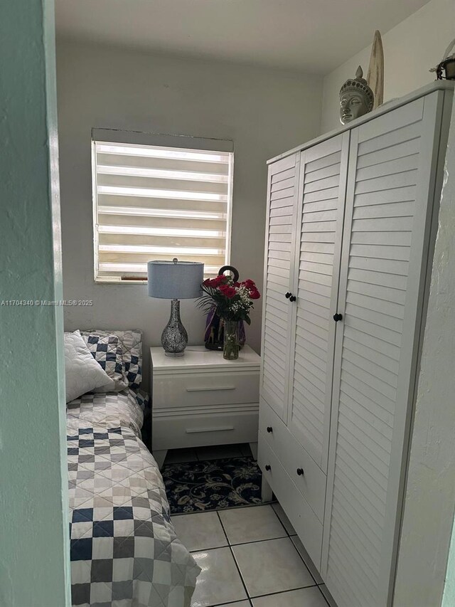 4201 Indian Creek Dr Unit 5, Miami Beach, FL 33140 - bedroom with light tile patterned floors