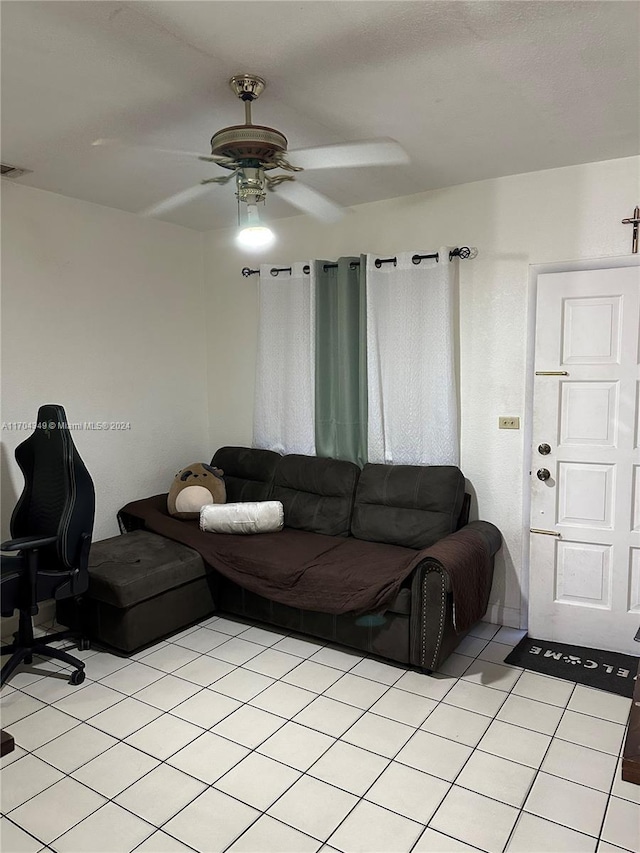 1838 NW 18th St, Miami, FL 33125 - living room with ceiling fan and light tile patterned floors
